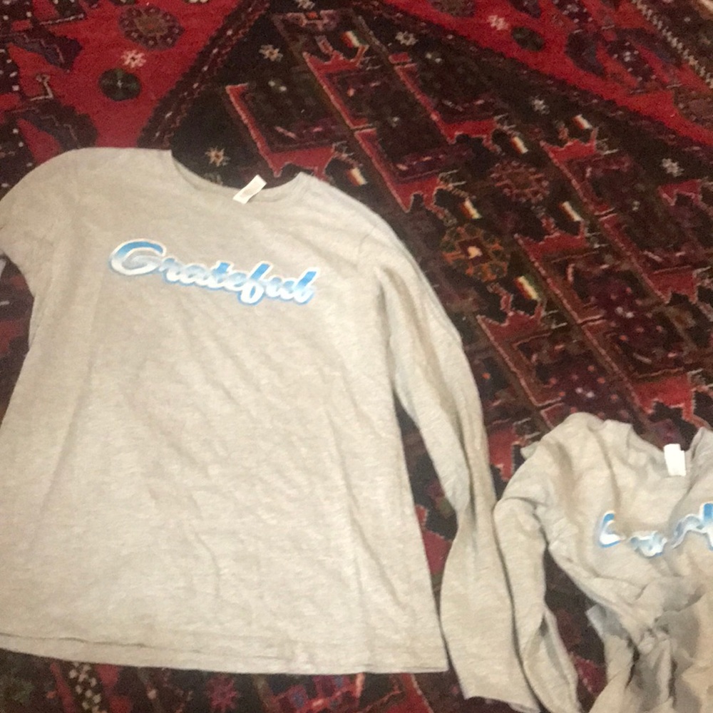 two grey long sleeve